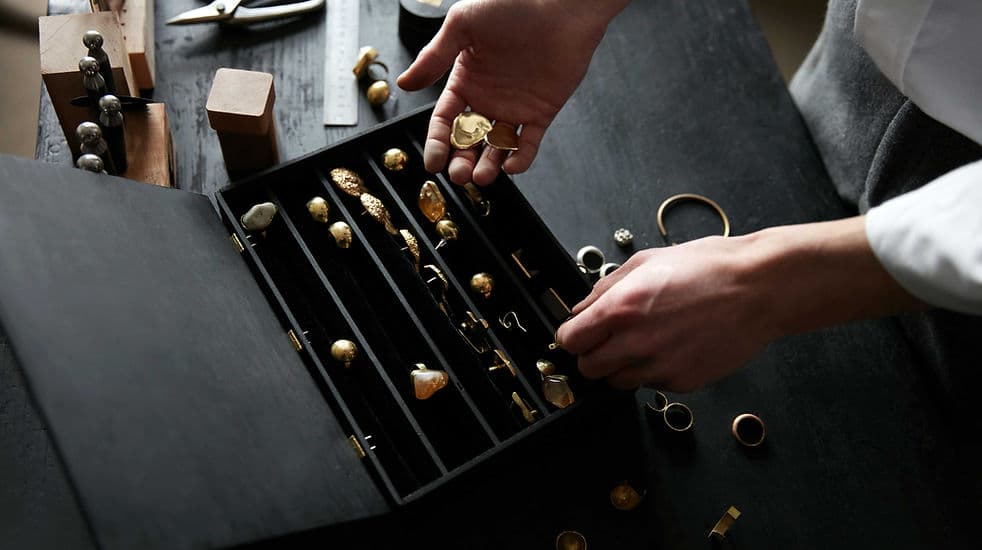 Luxury gold jewelry representing tailored financial partnerships